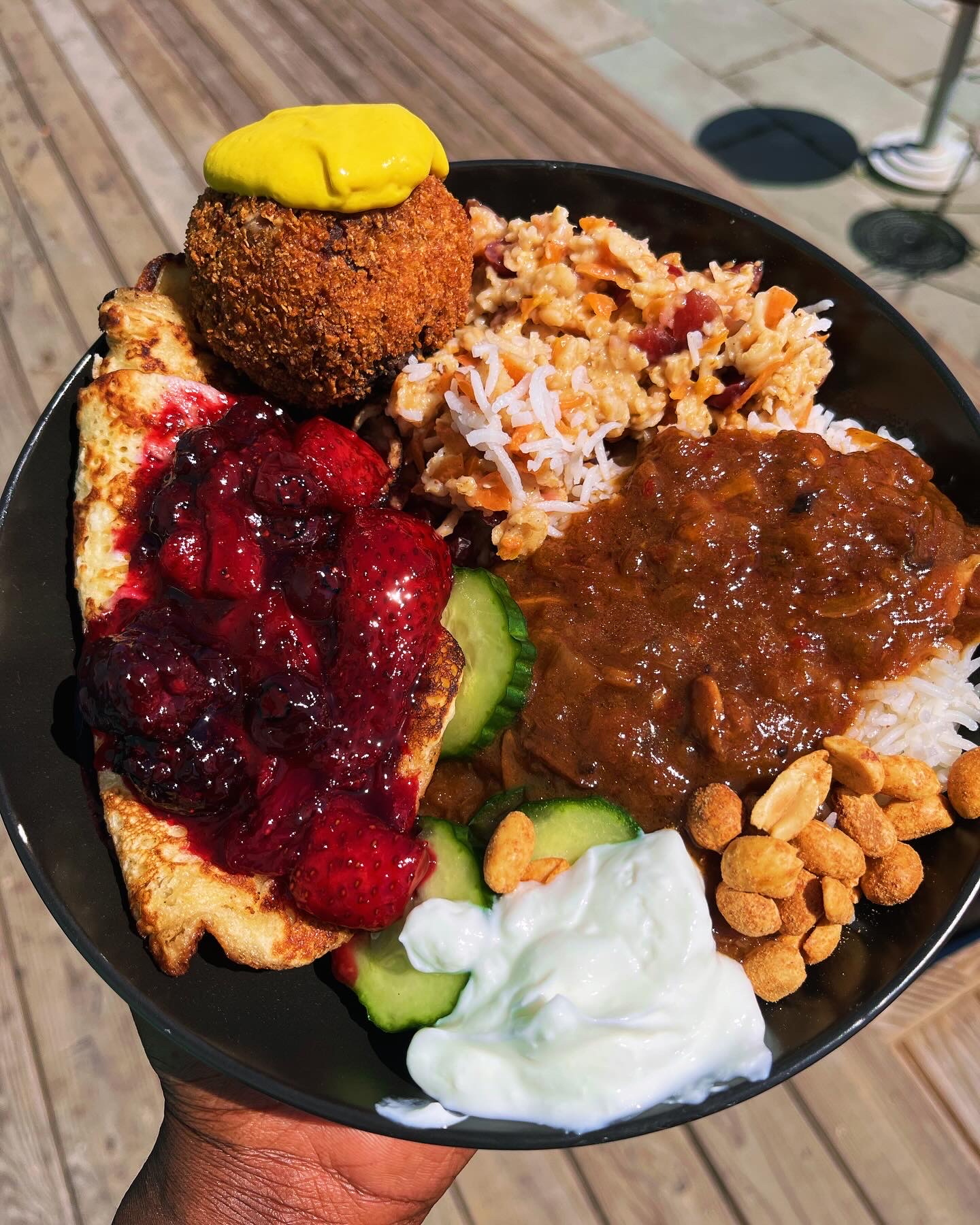 Trinidadian-style curry plate with breadfruit and kachumbari
