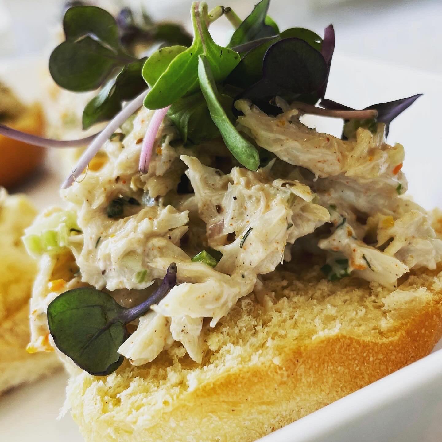 Maryland crab on milk bread with microgreens